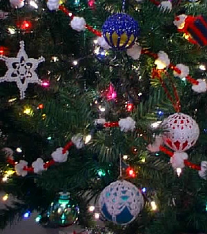 Ornament close-ups: snowflake, "popcorn" garland, satin ball covers