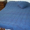 Ripple-effect mosaic afghan and matching pillow