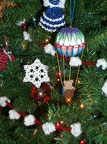 Ornament close-ups: balloon bear, snowflake, popcorn garland