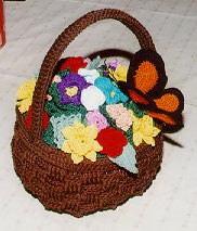 Flower basket with butterfly on top